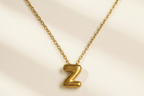 Collier Initiale en Acier Inoxydable – Essence