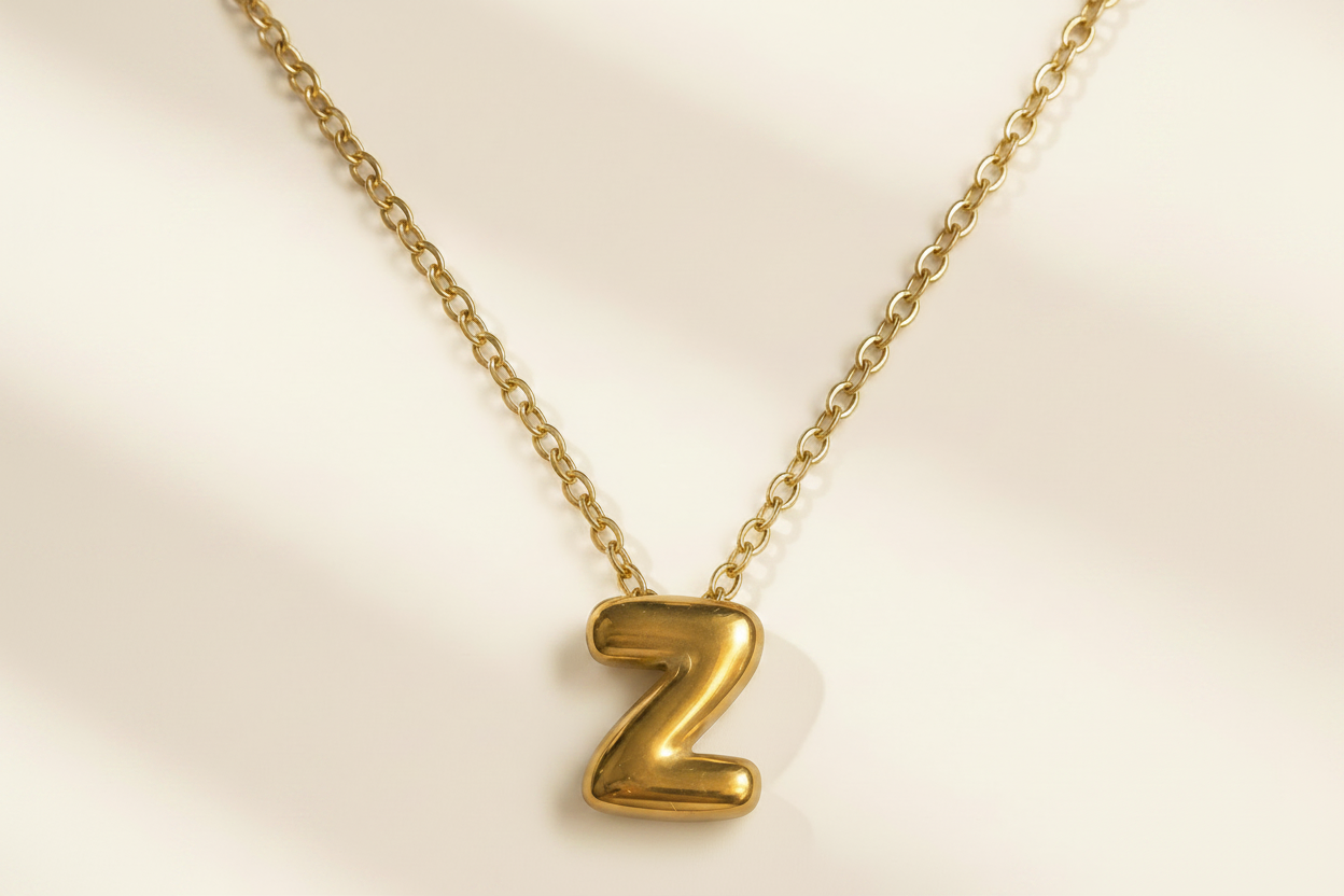 Collier Initiale en Acier Inoxydable – Essence