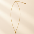 Collier Initiale en Acier Inoxydable – Essence