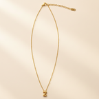 Collier Initiale en Acier Inoxydable – Essence