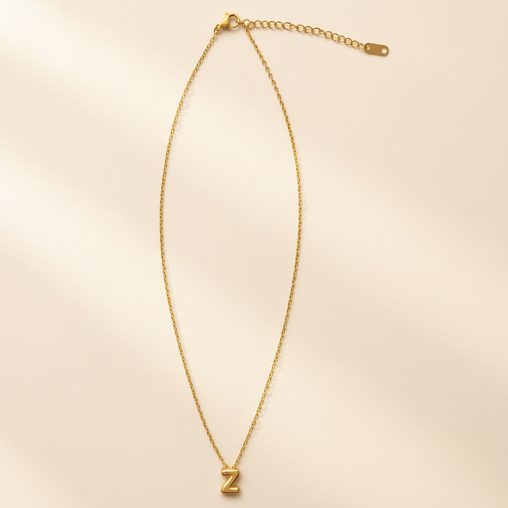 Collier Initiale en Acier Inoxydable – Essence